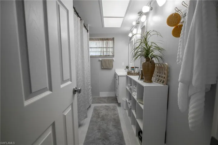 Bathroom with vanity and tile patterned floors