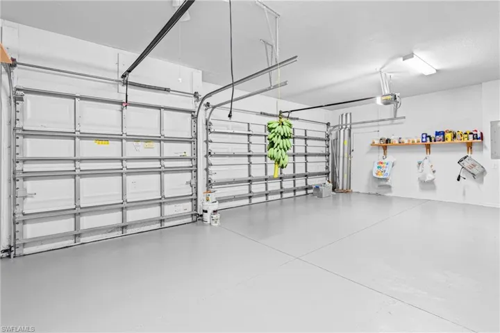 Garage featuring electric panel