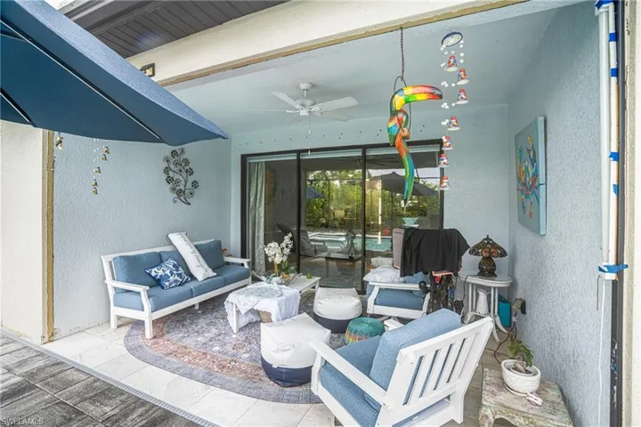 View of patio / terrace with an outdoor living space and a ceiling fan