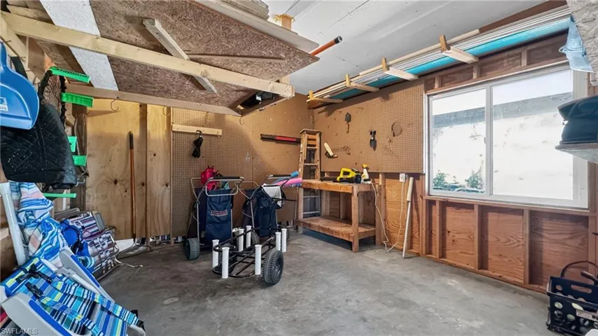 BOTH UNITS HAVE NEARLY IDENTICAL, BIG STORAGE AREAS WITH A BUILT-IN WORK BENCH.