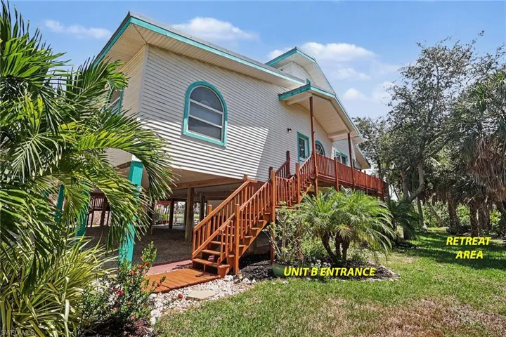 BLUE BAYOU B:  ENTRANCE.  EXPANSIVE PORCH.
