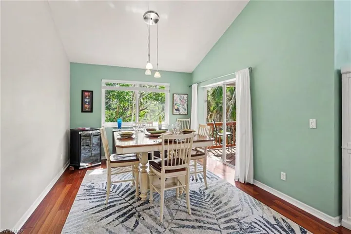 BLUE BAYOU B:  DINING ROOM WITH EASTERN EXPOSURE WINDOW AND SOUTHERN EXPOSURE SLIDING DOORS