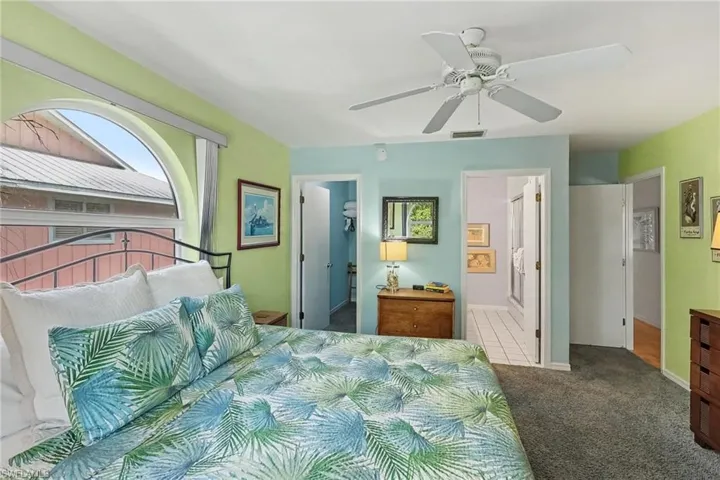 BLUE BAYOU A:  PRIMARY SUITE SHOWING WALK-IN CLOSET AND EN-SUITE BATH