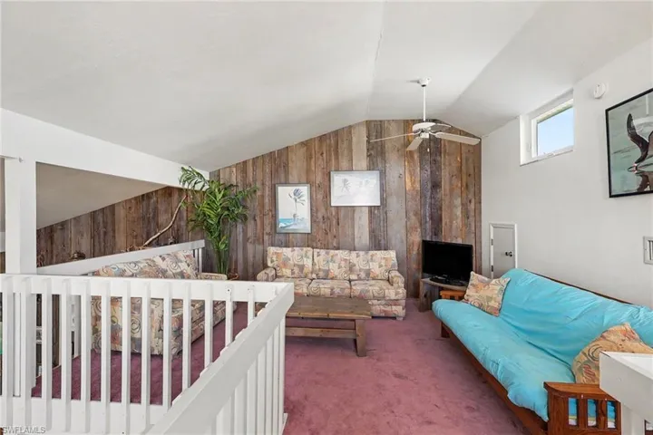 BLUE BAYOU A:  LOFT AREA.  CARPETED.  CLERESTORY WINDOWS.  "BARN-WOOD" STYLE DECORATIVE WALLS.  FUTON AND PULL-OUT SOFA.