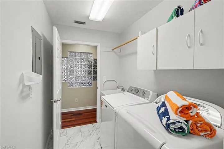BLUE BAYOU B:  LAUNDRY ROOM.  HALL LEADS TO BEDROOMS.