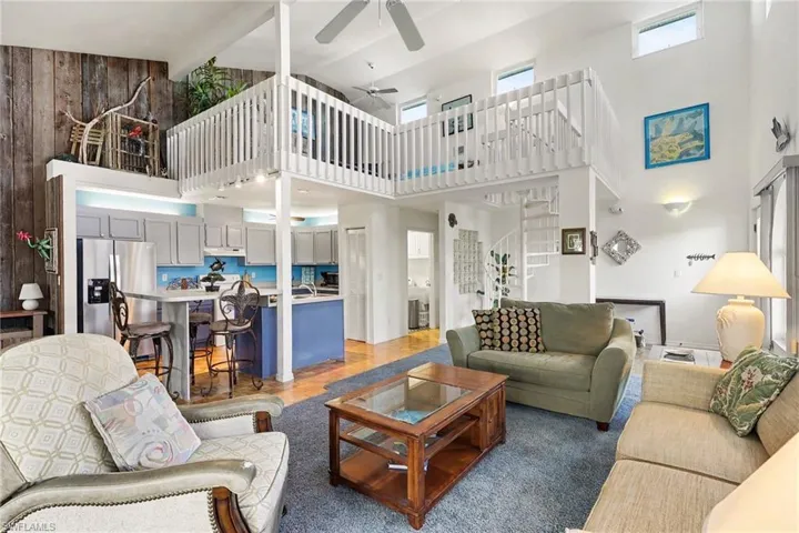 BLUE BAYOU A:  MAIN LIVING AREA.  DECORATIVE GLASS BLOCK BRINGS LIGHT IN TO HALLWAY. BEDROOMS ARE  THROUGH THAT HALLWAY.  CARPETED LIVING AREA.