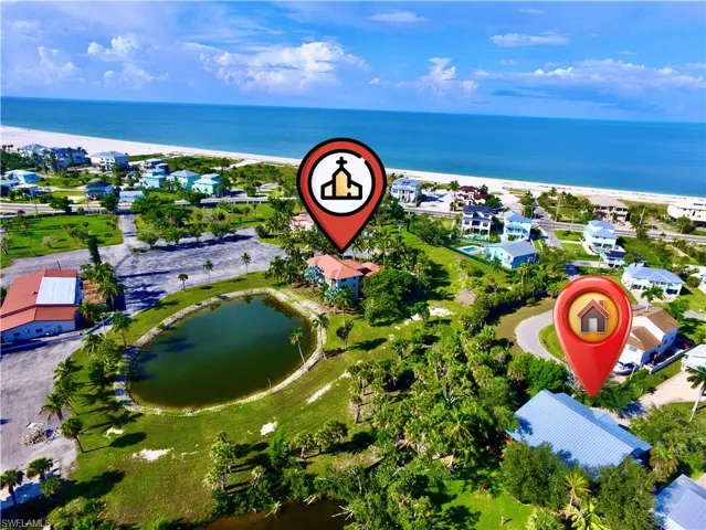 AERIAL VIEW SHOWING PROXIMITY TO BEACH AS WELL AS TO NEIGHBORING CATHOLIC CHURCH PROPERTY