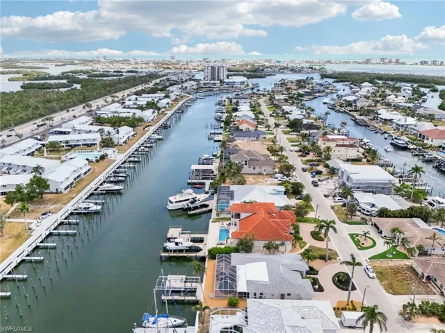 Aerial view of residential area with a large body of water