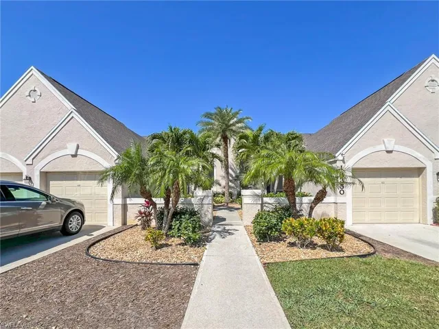 Paved, attractively landscaped entrance to Verandas
