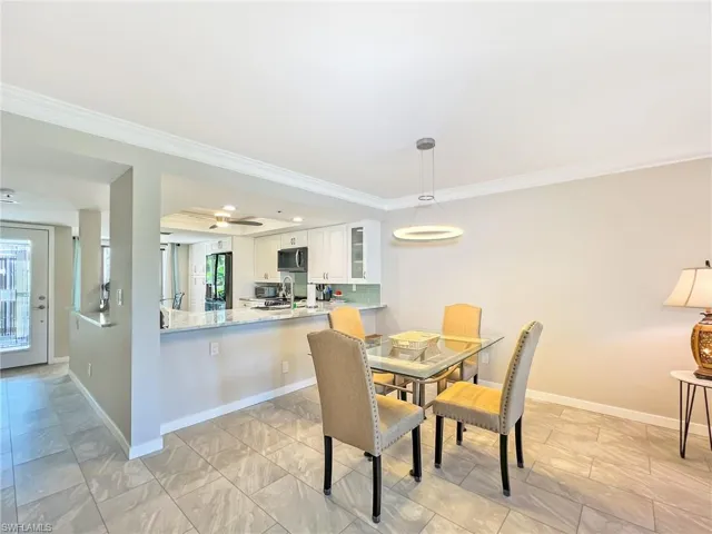 Large dining area.  Notice beautiful luxury vinyl tile flooring.
