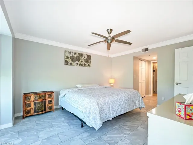 View from Master Bedroom to hallway with two walk in closets and then to Master Bath