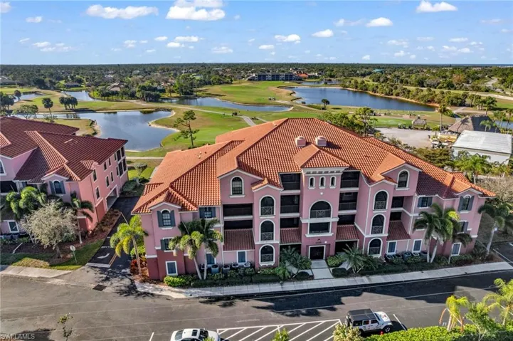 Bird's eye view of a nearby body of water and a golf club