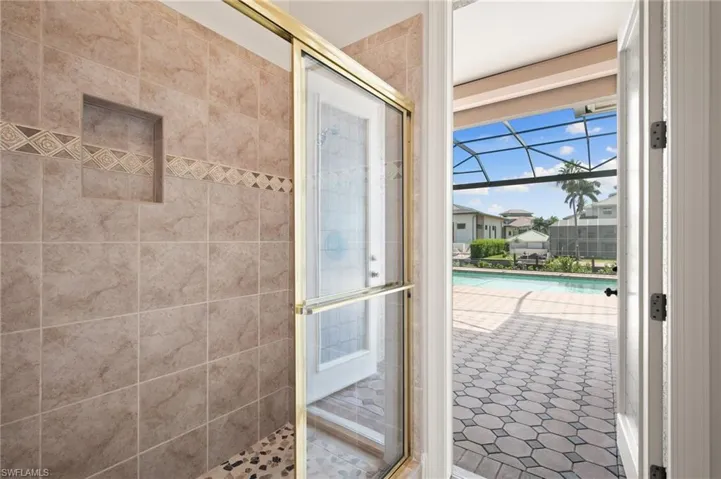 Bathroom featuring tiled shower