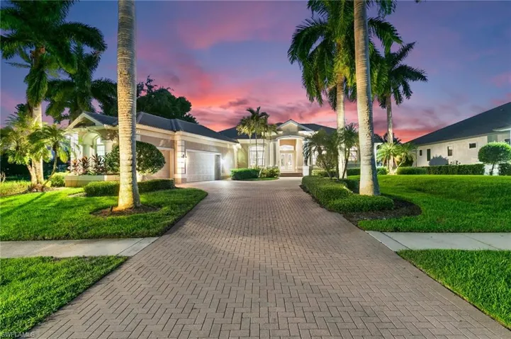 Ranch-style home featuring a yard