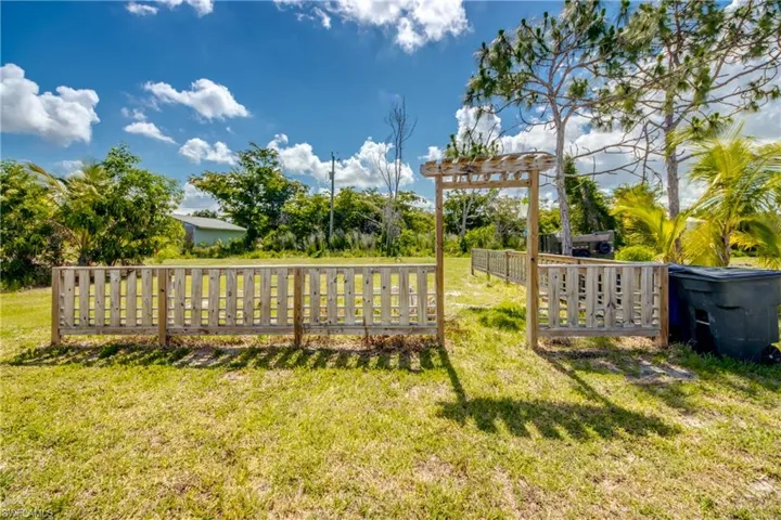 View of yard with a pergola