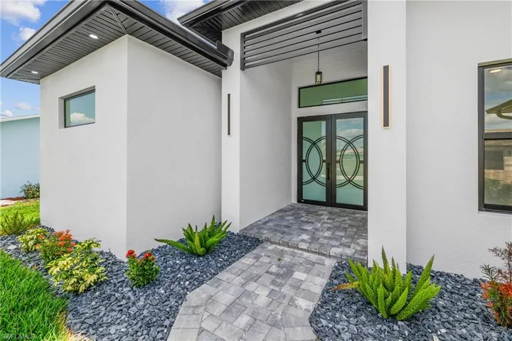 Entrance to property featuring french doors