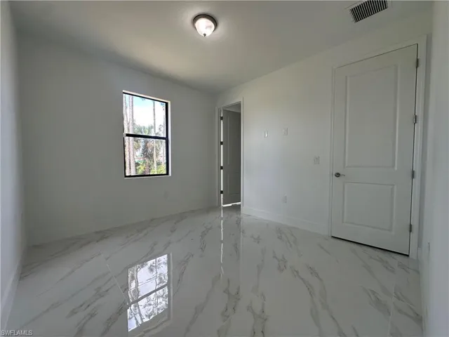View of tiled empty room