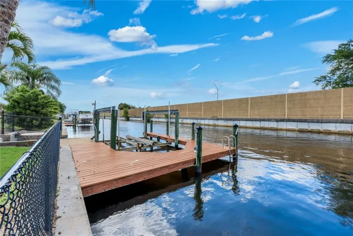 Private dock with boat lift and direct Gulf access