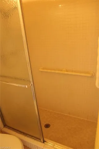 Bathroom featuring toilet and walk in shower