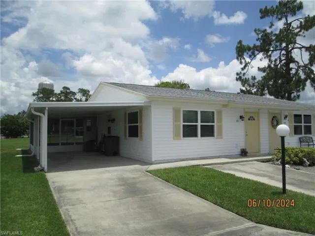 Ample parking with carport and two driveways