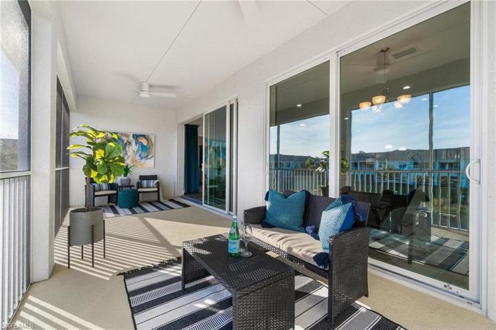 Expansive lanai space with room for multiple seating areas.