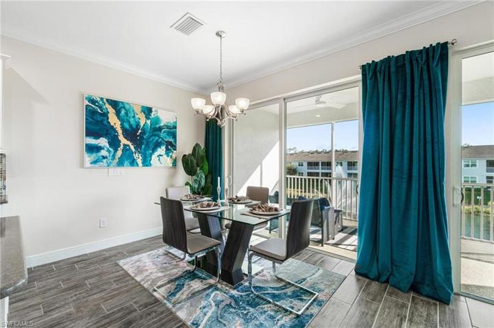 Dining area overlooking the lake with central water feature.