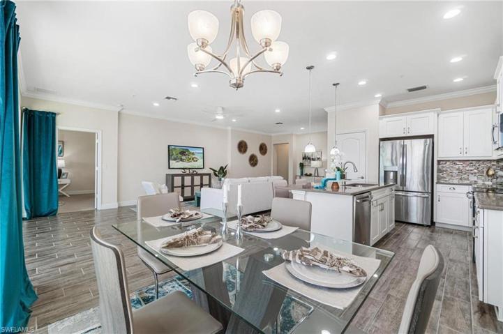 Open floor plan showing dining, kitchen and living area.