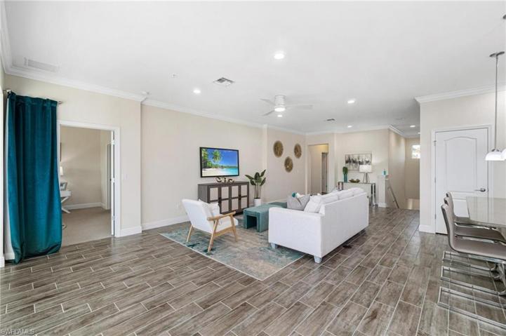 Living area, master bedroom door to the left.