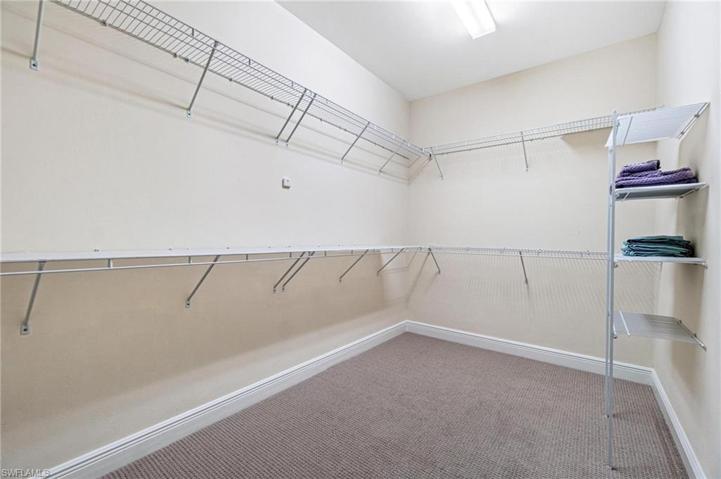LARGE Primary Walk - In Closet