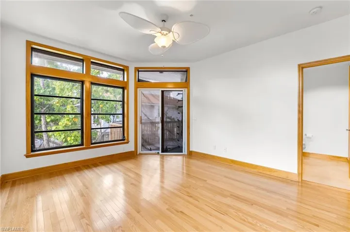 Bedroom featuring a ceiling fan and light wood-style floors