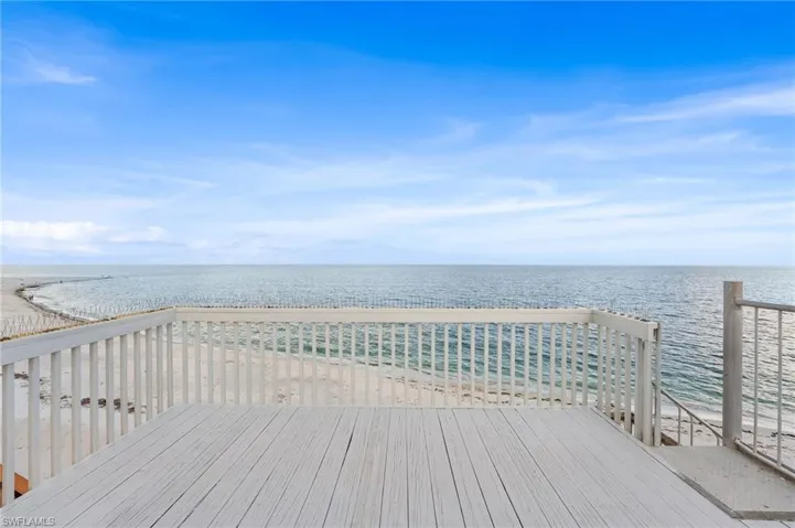 Wooden deck with a water view