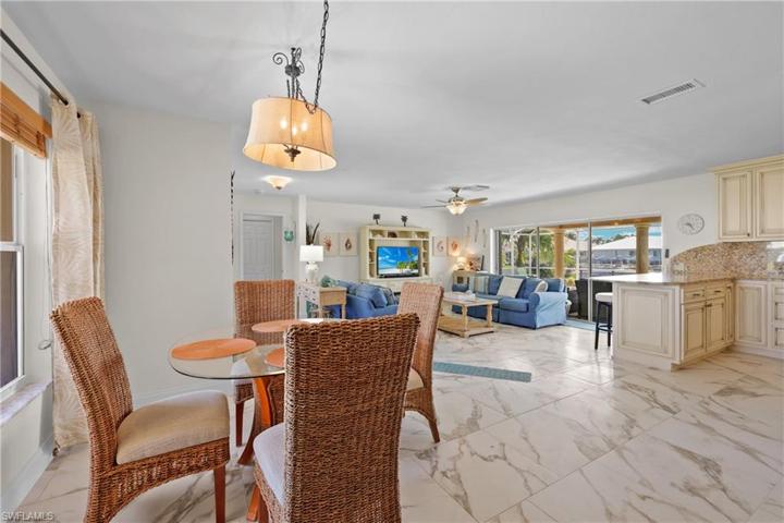 Dining family and kitchen.. 1 step down into living area
