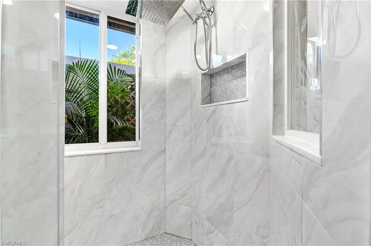 New shower tile, glass doors and roll in entry...nice view too!!!
