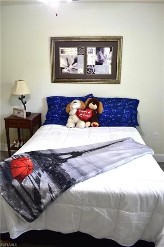 Bedroom featuring baseboards