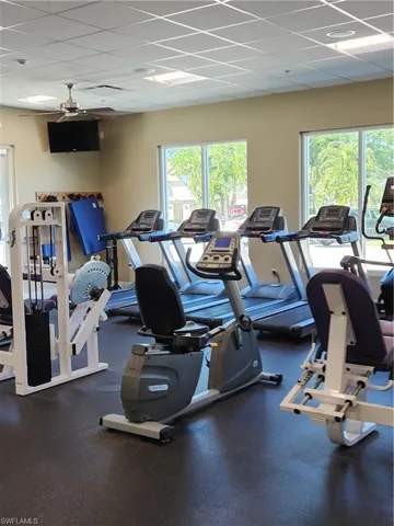 Workout area with a paneled ceiling