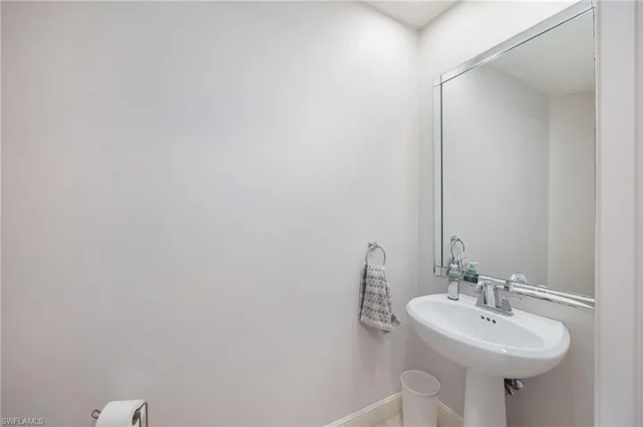 Bathroom featuring baseboards