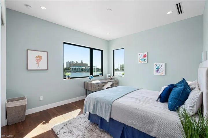 Bedroom featuring dark hardwood / wood-style floors