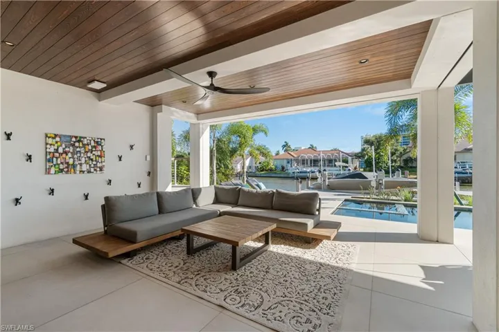 View of patio featuring ceiling fan and outdoor lounge area