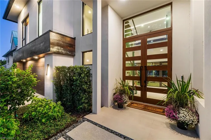 Property entrance with french doors