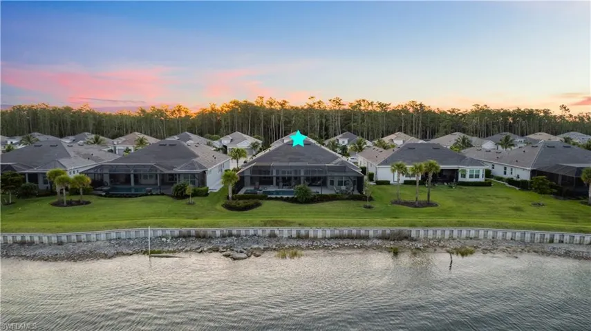 Aerial view at dusk with a water view