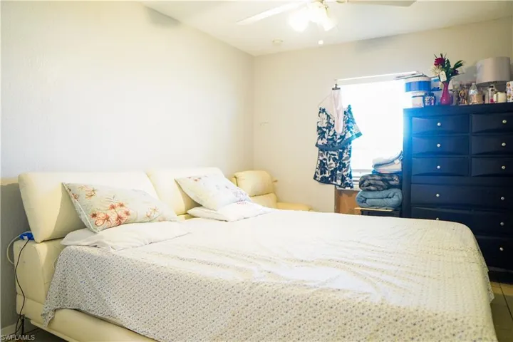 Bedroom featuring a ceiling fan