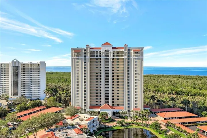 View of apartment building / complex with a water view