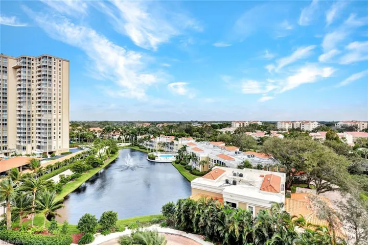 Aerial view of a nearby body of water and apartment complex