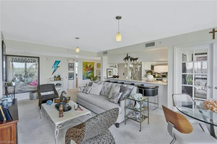 Living area with light carpet