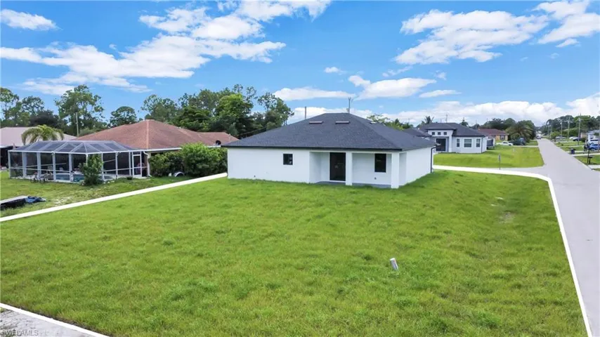 View of front of property with a front lawn