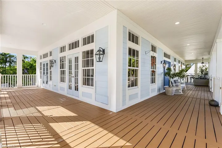Wrap around porch has so many seating area options!