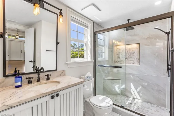 This is the 4th bathroom which is right across from the office/den/4th bedroom. This is located on the 1st level.