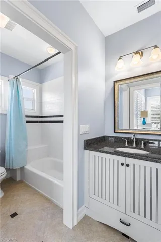 The 3rd ensuite bath offers a shower/tub combination.