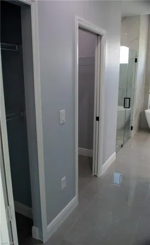 Bathroom with a shower with door