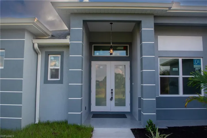 Doorway to property with french doors